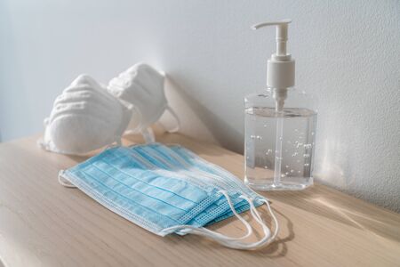 Coronavirus corona virus prevention travel surgical masks and hand sanitizer gel for hand hygiene spread protection.の写真素材