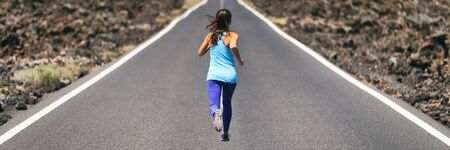 Run sport active lifestyle runner woman running on road landscape, panorama banner. People jogging...
