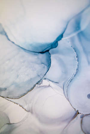 The picture is painted in alcohol ink. Abstraction will perfectly fit into a modern interior. Closeup of the painting. Colorful abstract painting background. Highly-textured paint.の写真素材