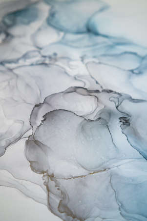 The picture is painted in alcohol ink. Abstraction will perfectly fit into a modern interior. Closeup of the painting. Colorful abstract painting background. Highly-textured paint.の写真素材