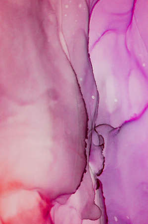 Alcohol ink. Artistic bright splash. Liquid artwork. Purple marble texture. Abstract ethereal swirl....