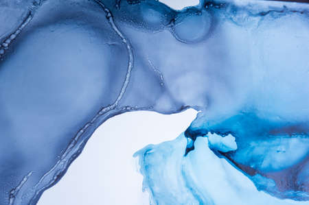 Alcohol ink. Artistic bright splash. Liquid artwork. Purple marble texture. Abstract ethereal swirl....