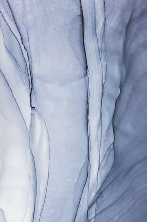 Abstract created using the technique of Alcohol ink. Macro photography of the smallest details of a...