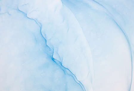 Alcohol ink sea texture. Contemporary art. Abstract art background. Multicolored bright texture. Fragment of artwork. Modern art. Inspired by the sky, as well as steam and smoke. Trendy wallpaper.の写真素材