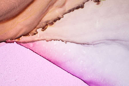 Abstract created using the technique of alcohol ink. Macro photography of the smallest details of a panting. The panting shows how overflows of shades and colors of paint resemble space motifs.の写真素材