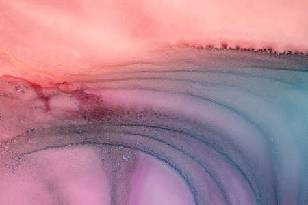 Abstract created using the technique of alcohol ink. Macro photography of the smallest details of a panting. The panting shows how overflows of shades and colors of paint resemble space motifs.の写真素材
