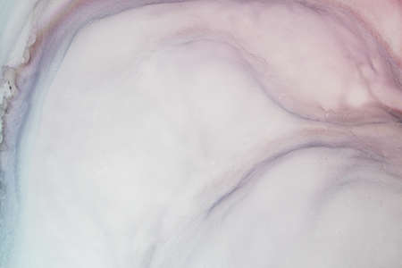 Abstract created using the technique of alcohol ink. Macro photography of the smallest details of a panting. The panting shows how overflows of shades and colors of paint resemble space motifs.の写真素材