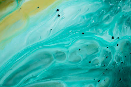 Abstract fluid acrylic painting. Marbled blue abstract background. Hand painted background with...