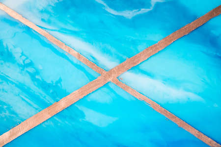 Applicable for design cover, annual report, invitation, flyer, presentation, packaging, poster, business card, wedding invitations. Macro photo of colorful abstract epoxy resin painting.の写真素材