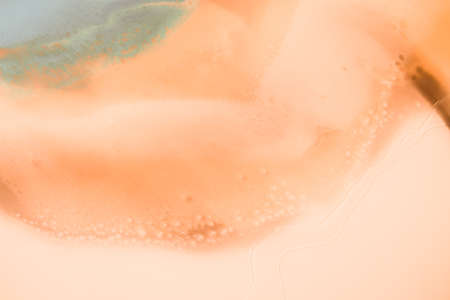 Liquid flow texture paint. modern art background. abstract epoxy resin painting. Green waves with...