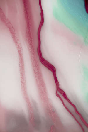 Liquid flow texture paint. modern art background. abstract epoxy resin painting. Green waves with...