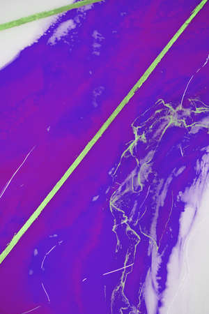 Liquid flow texture paint. modern art background. abstract epoxy resin painting. Green waves with...
