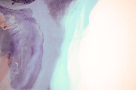 Liquid flow texture paint. modern art background. abstract epoxy resin painting. Green waves with bronze. abstract digital paper fine art pattern.の写真素材