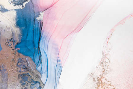 Aabstract fluid art painting in alcohol ink technique, mixture blue, red and gold paints. Marble stone glowing golden veins. High resolution. Frozen paint mixes, weaves incredible patterns and spots.の写真素材