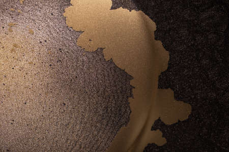 Gold glitter background, sparkle shine light confetti. Modern art. Abstract colorful wallpaper. Fluid Art for banners, ethereal graphic design.の写真素材