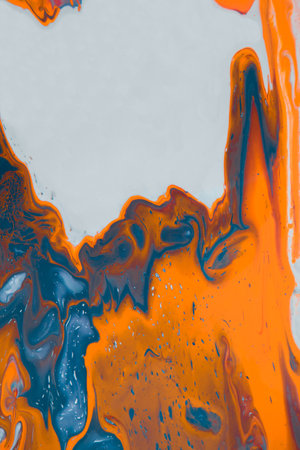 Abstract fluid acrylic painting. Marbled blue abstract background. Hand painted background with mixed liquid red, blue and green paints.の写真素材