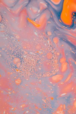 Abstract fluid acrylic painting. Marbled blue abstract background. Hand painted background with mixed liquid red, blue and green paints.の写真素材