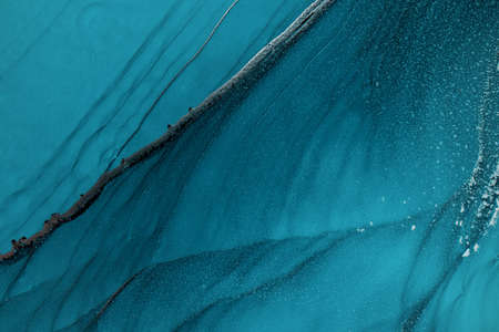 Ink, abstract, sea painting. Colorful liquid ink technique water texture for high resolution backdrop design.の写真素材