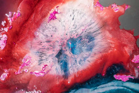 Petri art - a modern technique in painting, is created by adding alcoholic ink to epoxy. Macro photo...