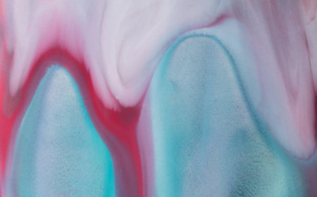 Fluid art texture. Background with abstract mixing paint. Liquid acrylic picture flows and splashes.