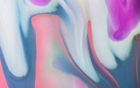 Swirls of vibrant blue, pink, and white merge fluidly, resembling an abstract.