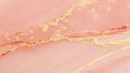 Delicate pink and gold abstract design showcasing soft textures and fluid patterns in a harmonious artistic compositionの写真素材