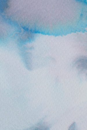 Soft blue watercolor blending seamlessly in an abstract composition with gentle curvesの写真素材
