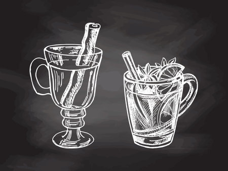 Hand-drawn sketch set of mugs with mulled wine on chalkboard background. Vector food drawing. A warming drink. Traditional Christmas drink. Vintage cozy seasonal holidays. Good for menu.のイラスト素材