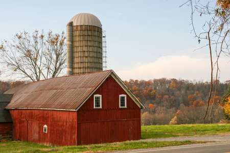Red Barn and Silo on a Farm in New York, USA.