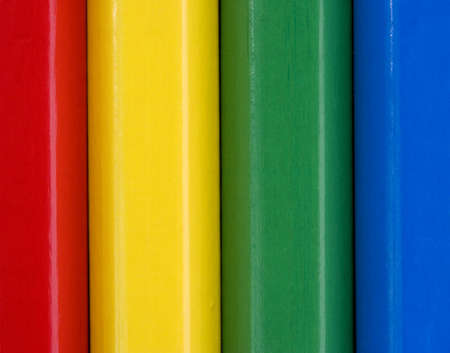 Colourful close up vertical pattern of childrens pencils.