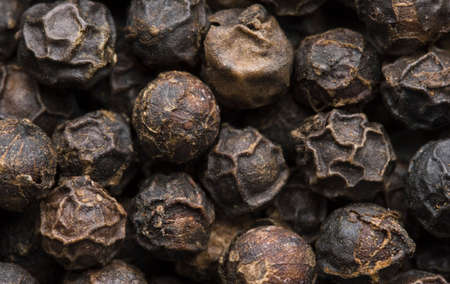 Macro image of peppercorns.