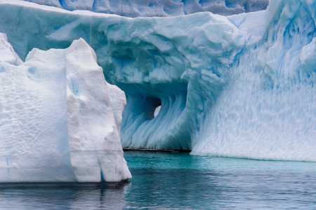 Antarctic icebergs and glaciers near Cuverville Island in the Antarctic Peninsula, Antarcticaの写真素材