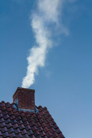 smoke coming out of chimneyの写真素材
