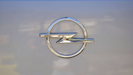 Herceg Novi, Montenegro - March 23, 2019: Close up of Opel classic symbol on a gray car. Opel is a...
