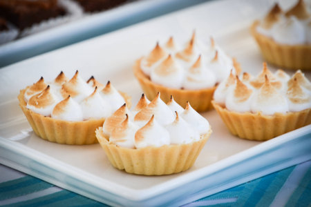 Delicious sweet mini lemon meringue tartsの写真素材