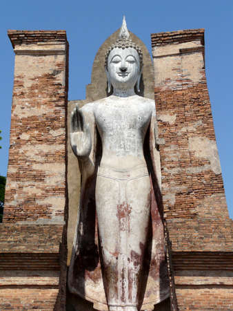 Giant Buddha statue in Sukothai Historical Park, Wat Mahathat, Sukothai, Thailandのeditorial素材
