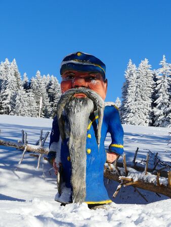 Wood carving and art in the snow at the Feldberg, Black Forest, Germanyの写真素材