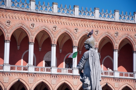 One of the sculptures of famous Padova people standing round Pratto della Valle, Padova, Veneto,...