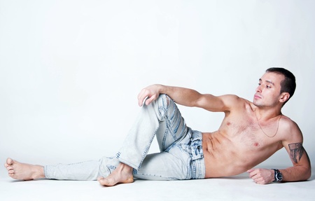 Handsome sporty male model with great body buildの写真素材