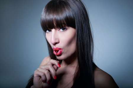Glamour portrait of sexy woman model with natural makeup, long healthy shiny hair and long fringe,...