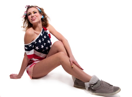 Full length portrait of beautiful young funny American patriotic girlの写真素材