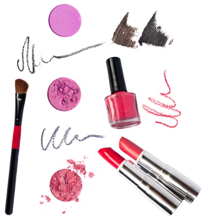 Still life of a small makeup kit light tender pink eyeshadow, red lip pencilの写真素材