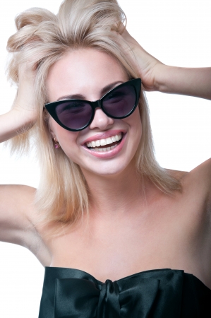 Funny young blond woman model wearing sun glassesの写真素材