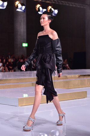 SYDNEY AUSTRALIA - 15 May 2016: Toni Maticevski female evening and red carpet dresses clothing collection fashion show runway at Mercedes Benz Fashion Week in The Cutaway Barangaroo Reserve Australiaのeditorial素材