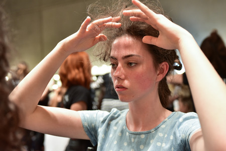 SYDNEY / AUSTRALIA - 20 May: Models stylists and makeup artists get prepared for show before Raffles International Showcase at Mercedes Benz Fashion Week Australia on 20 May 2016 in Carriageworks Sydneyのeditorial素材