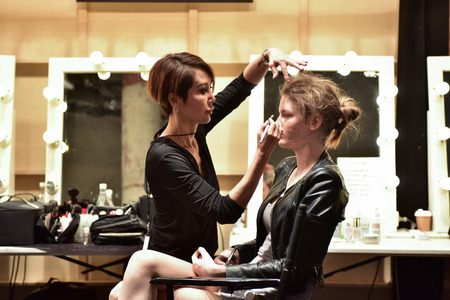 SYDNEY / AUSTRALIA - 20 May: Models stylists and makeup artists get prepared for show before Raffles International Showcase at Mercedes Benz Fashion Week Australia on 20 May 2016 in Carriageworks Sydneyのeditorial素材
