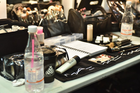 SYDNEY / AUSTRALIA - 20 May: Makeup table with cosmetics brushes pencils et cetera for show before House of Cannon fashiob show at Mercedes Benz Fashion Week Australia on 20 May 2016 in Carriageworks Sydneyのeditorial素材