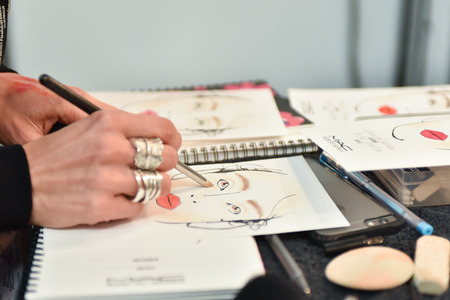 SYDNEY / AUSTRALIA - 20 May: Makeup artist creates samples of makeup for show before House of Cannon fashiob show at Mercedes Benz Fashion Week Australia on 20 May 2016 in Carriageworks Sydneyのeditorial素材