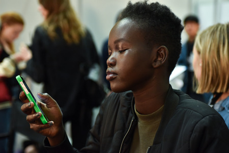 SYDNEY / AUSTRALIA - 20 May: A couple of models get ready at backstage of House of Cannon fashiob show at Mercedes Benz Fashion Week Australia on 20 May 2016 in Carriageworks Sydneyのeditorial素材