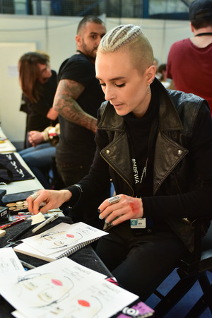 SYDNEY / AUSTRALIA - 20 May: Makeup artist creates samples of makeup for show before House of Cannon fashiob show at Mercedes Benz Fashion Week Australia on 20 May 2016 in Carriageworks Sydneyのeditorial素材